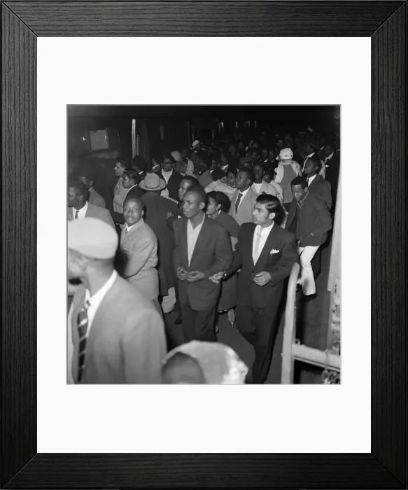 Framed Print : Nearly 1000 West Indian immigrants arrive in three boats trains at Waterloo Station Framed Print : Nearly 1000 West Indian immigrants arrive in three boats trains at Waterloo Station