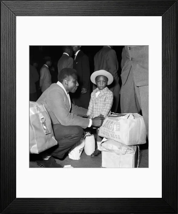 Framed Print : Nearly 1000 West Indian immigrants arrive in three boats trains at Waterloo Station