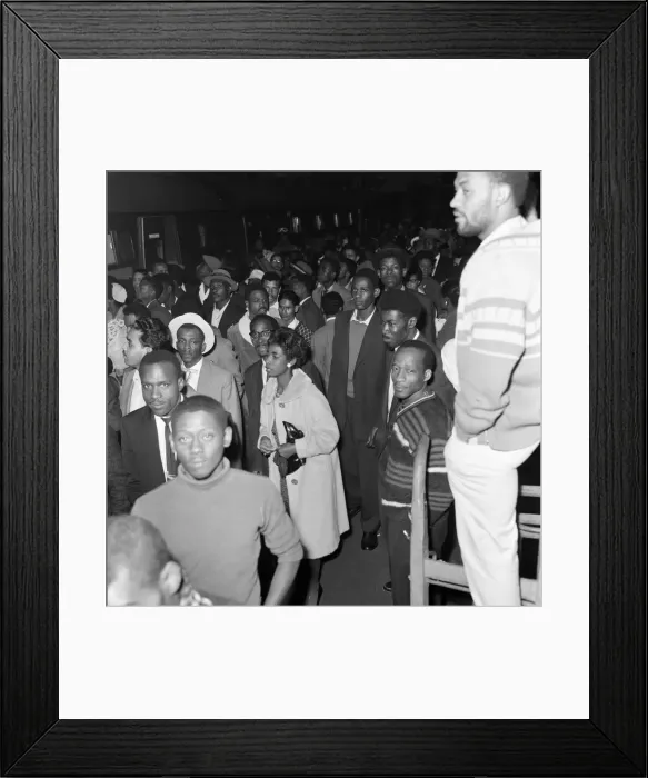Framed Print : Nearly 1000 West Indian immigrants arrive in three boats trains at Waterloo Station