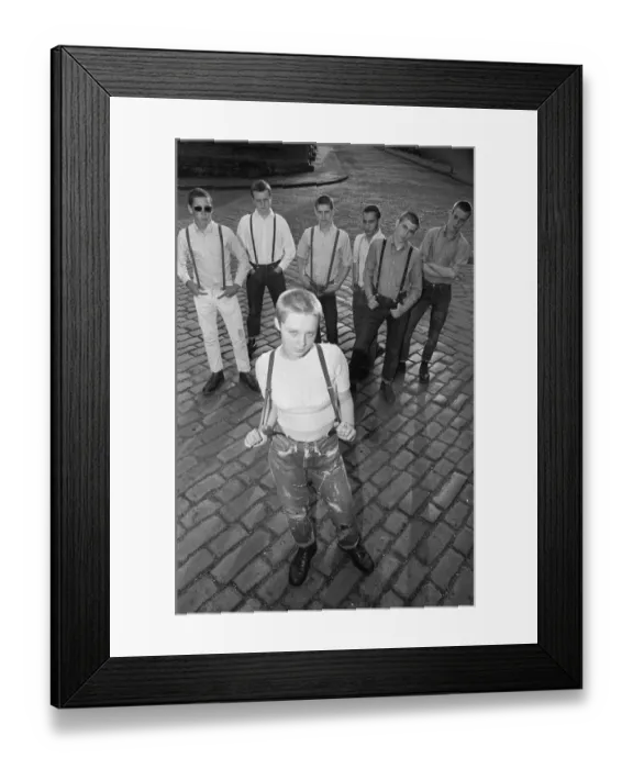 Framed Print : Seventeen year old skinhead teenager Janet Askham poses with her friends at her home in Framed Print : Seventeen year old skinhead teenager Janet Askham poses with her friends at her home in
