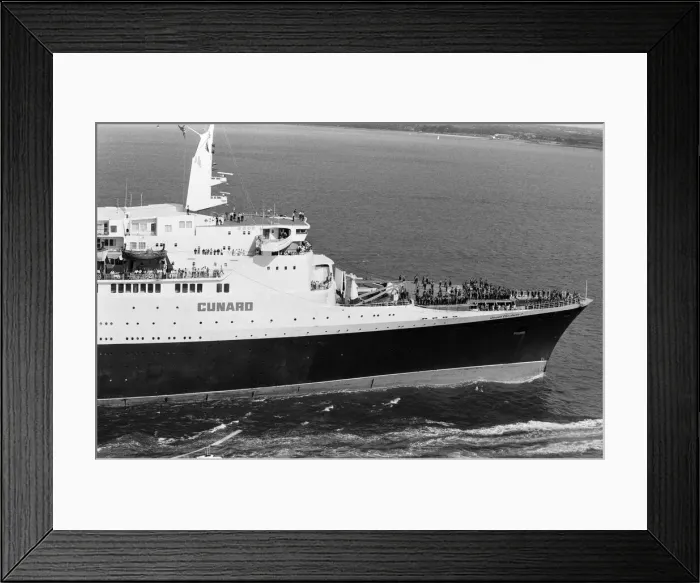 Framed Print : QE2 returns home to Southampton. Union Jacks are festooned on cars, draped on shoulders Framed Print : QE2 returns home to Southampton. Union Jacks are festooned on cars, draped on shoulders