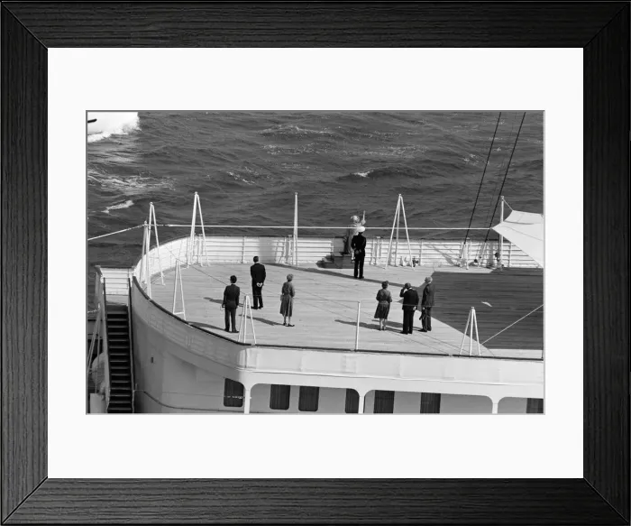 Framed Print : QE2 returns home to Southampton. Union Jacks are festooned on cars, draped on shoulders Framed Print : QE2 returns home to Southampton. Union Jacks are festooned on cars, draped on shoulders