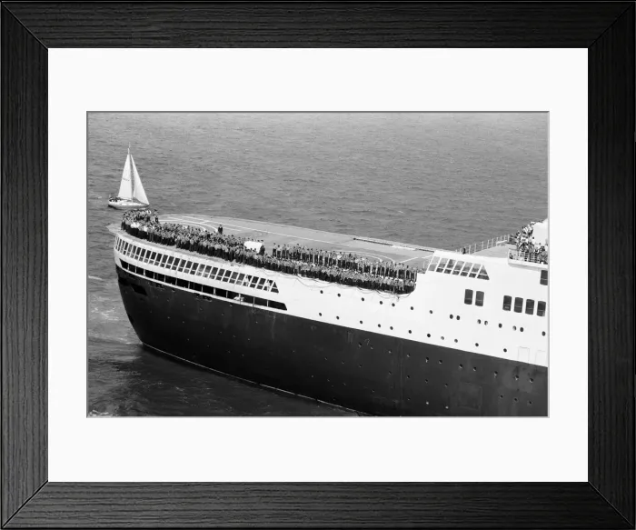 Framed Print : QE2 returns home to Southampton. Union Jacks are festooned on cars, draped on shoulders Framed Print : QE2 returns home to Southampton. Union Jacks are festooned on cars, draped on shoulders