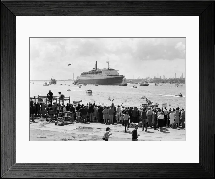 Framed Print : QE2 returns home to Southampton. Union Jacks are festooned on cars, draped on shoulders Framed Print : QE2 returns home to Southampton. Union Jacks are festooned on cars, draped on shoulders