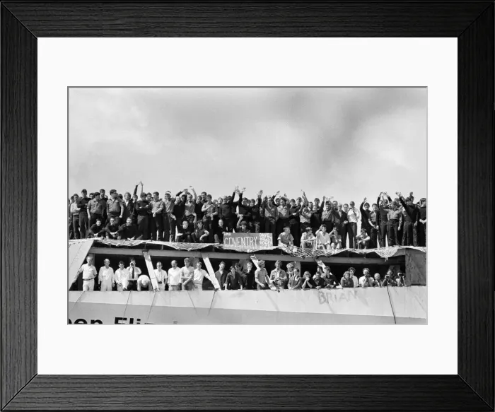 Framed Print : QE2 returns home to Southampton. Union Jacks are festooned on cars, draped on shoulders Framed Print : QE2 returns home to Southampton. Union Jacks are festooned on cars, draped on shoulders