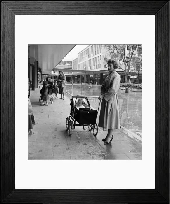 Framed Print : Stevenage New Town, Hertfordshire, where shoppers walk in the shelter of canopies Framed Print : Stevenage New Town, Hertfordshire, where shoppers walk in the shelter of canopies