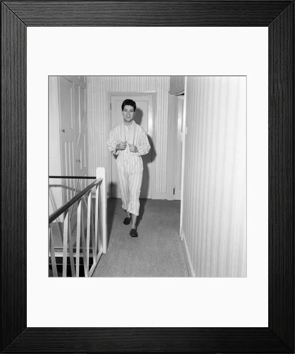 Framed Print : Teenage pop idol Cliff Richard relaxes on his divan at his Winchmore Hill home