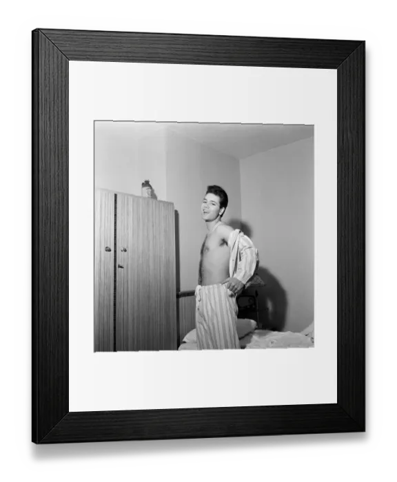 Framed Print : Teenage pop idol Cliff Richard relaxes on his divan at his Winchmore Hill home Framed Print : Teenage pop idol Cliff Richard relaxes on his divan at his Winchmore Hill home
