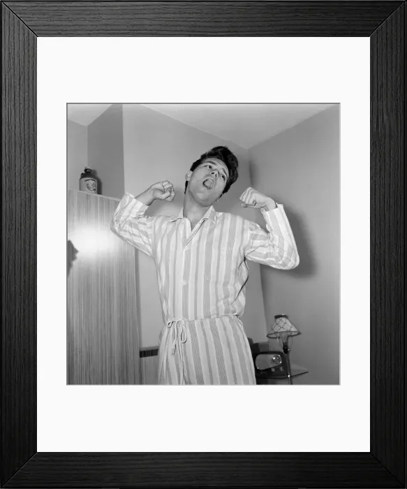 Framed Print : Teenage pop idol Cliff Richard relaxes on his divan at his Winchmore Hill home Framed Print : Teenage pop idol Cliff Richard relaxes on his divan at his Winchmore Hill home