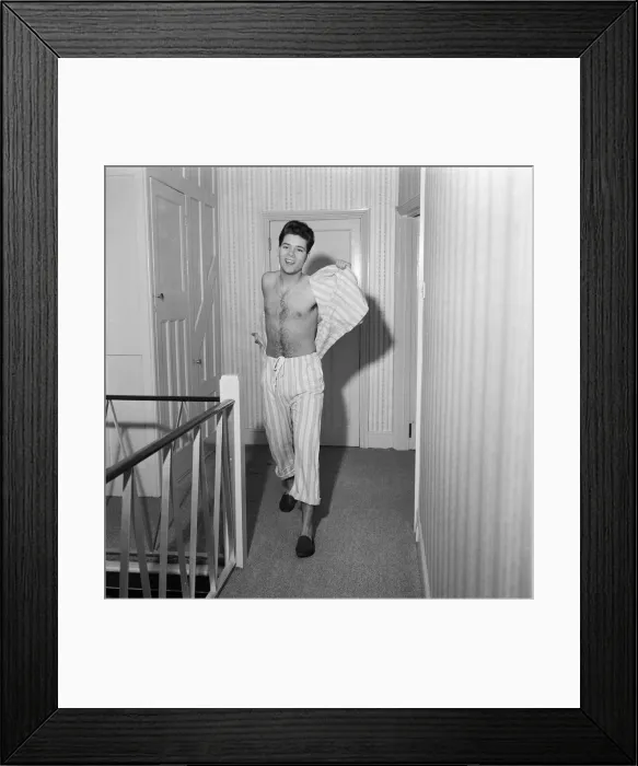 Framed Print : Teenage pop idol Cliff Richard relaxes on his divan at his Winchmore Hill home Framed Print : Teenage pop idol Cliff Richard relaxes on his divan at his Winchmore Hill home