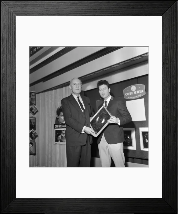 Framed Print : Singer Cliff Richard with his Silver Disc award for the single I Love You Framed Print : Singer Cliff Richard with his Silver Disc award for the single I Love You