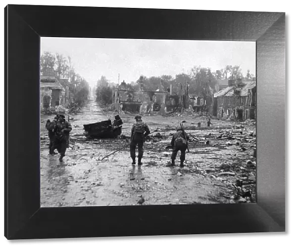 British army sappers of the Royal Engineers clearing the town of Tilly Sur Seulles of