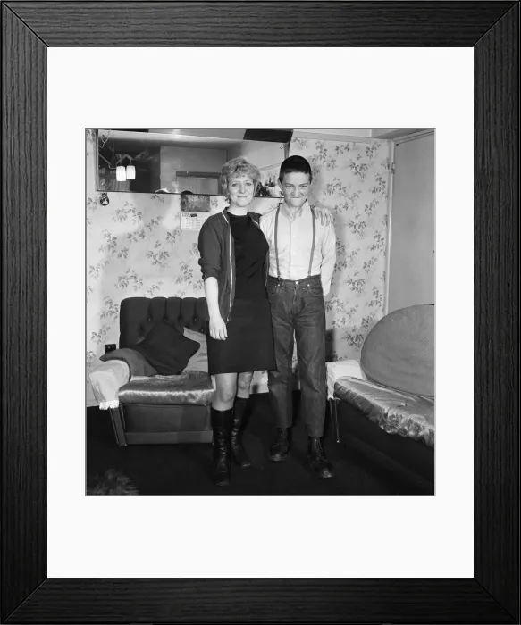 Framed Print : Fifteen year old skinhead Chris Harward poses at home with his mother Joan at their flat Framed Print : Fifteen year old skinhead Chris Harward poses at home with his mother Joan at their flat