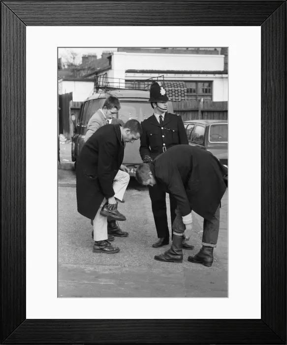 Framed Print : Police at Southend stopped any possible trouble makers, making them remove bootlaces Framed Print : Police at Southend stopped any possible trouble makers, making them remove bootlaces
