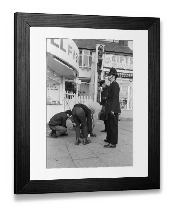 Framed Print : Police at Southend stopped any possible trouble makers, making them remove bootlaces