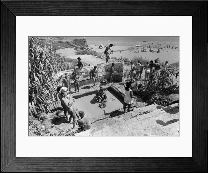 Framed Print : Young people on holiday in Corfu on a Club 18-30 holiday. Young people wrestle in the mud Framed Print : Young people on holiday in Corfu on a Club 18-30 holiday. Young people wrestle in the mud