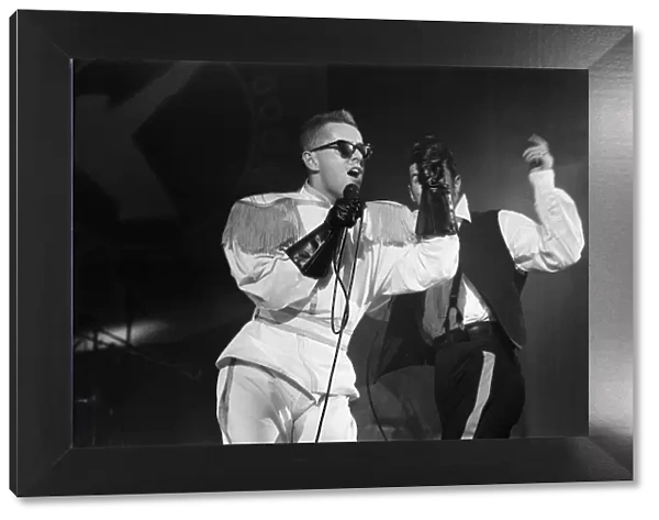 Frankie Goes To Hollywood performing in concert, Holly Johnson pictured on stage