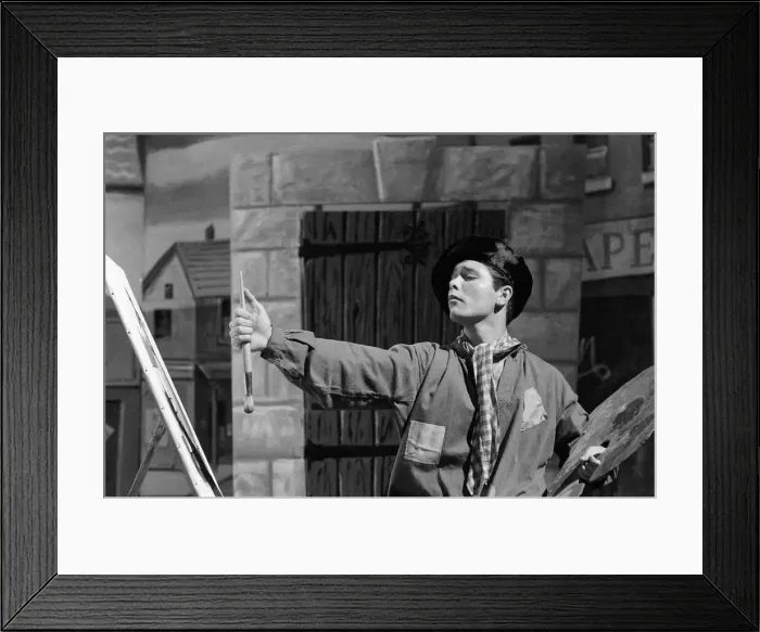 Framed Print : Cliff Richard on the set of the film Summer Holiday, painting with a brush and easel Framed Print : Cliff Richard on the set of the film Summer Holiday, painting with a brush and easel