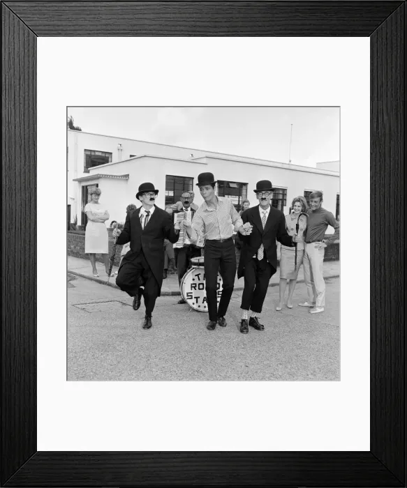 Framed Print : Recognise the bowler-hatted busker'? Its Cliff Richard Framed Print : Recognise the bowler-hatted busker'? Its Cliff Richard