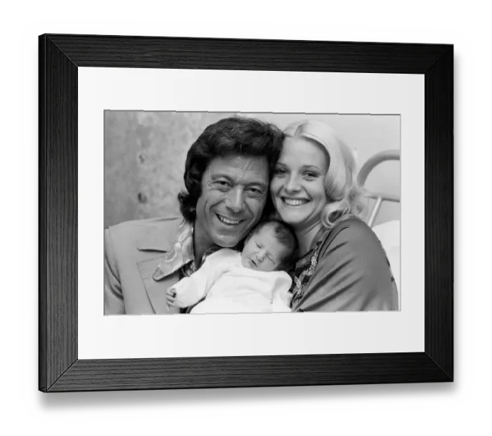 Framed Print : Lionel Blair with his wife Susan and their new baby daughter Lucy at the Avenue Clinic Framed Print : Lionel Blair with his wife Susan and their new baby daughter Lucy at the Avenue Clinic
