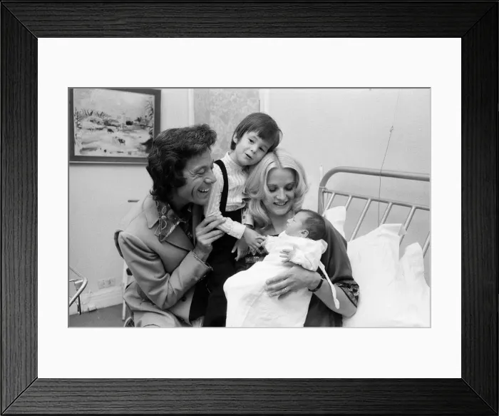 Framed Print : Lionel Blair with his wife Susan and their new baby daughter Lucy at the Avenue Clinic