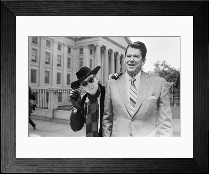 Framed Print : Holly Johnson posing outside the White House with a full-size cutout of Ronald Reagan Framed Print : Holly Johnson posing outside the White House with a full-size cutout of Ronald Reagan
