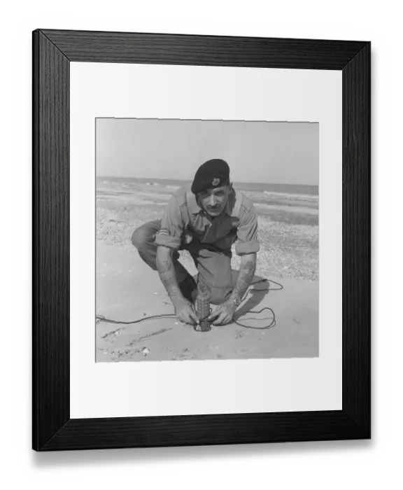 Framed Print : Suez Crisis 1956 Seargent Bill Kidd of the Royal Engineers prepares a mine for Framed Print : Suez Crisis 1956 Seargent Bill Kidd of the Royal Engineers prepares a mine for