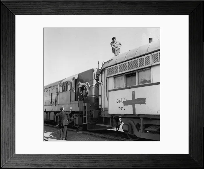 Framed Print : Suez Crisis 1956 The station master at El Cap talks to the British Royal Engineers Framed Print : Suez Crisis 1956 The station master at El Cap talks to the British Royal Engineers