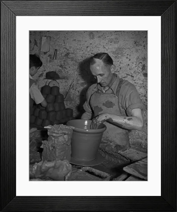 Framed Print : Bilston Pottery 5th May 1958 A potter seen here throwing a large flower pot Framed Print : Bilston Pottery 5th May 1958 A potter seen here throwing a large flower pot