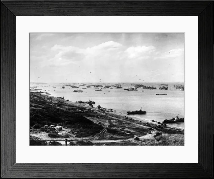 Framed Print : A general view of a beach in France, three weeks after D-Day showing the constant flow of