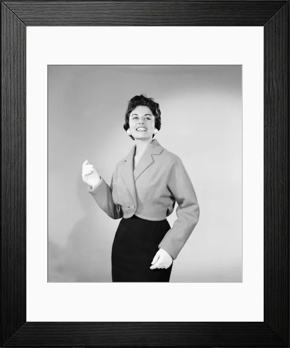 Framed Print : Eunice Gayson, actress and model, poses in a jacket for Sunday Mirror Promotion Framed Print : Eunice Gayson, actress and model, poses in a jacket for Sunday Mirror Promotion