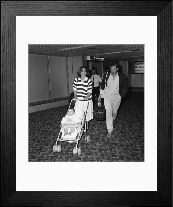 Framed Print : Leslie Grantham at LAP with his wife Jane and their baby. 24th June 1987