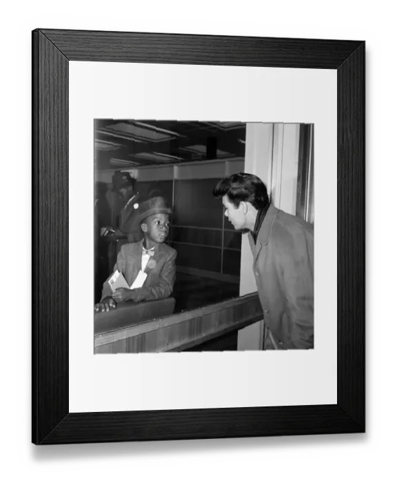 Framed Print : Cliff Richard and the Shadows at London Airport. This little Jamaican boy has just flown Framed Print : Cliff Richard and the Shadows at London Airport. This little Jamaican boy has just flown