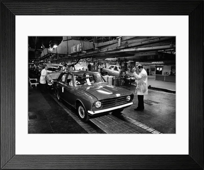Framed Print : The first car on the production line at Ford motor plant in Dagenham following the strike Framed Print : The first car on the production line at Ford motor plant in Dagenham following the strike