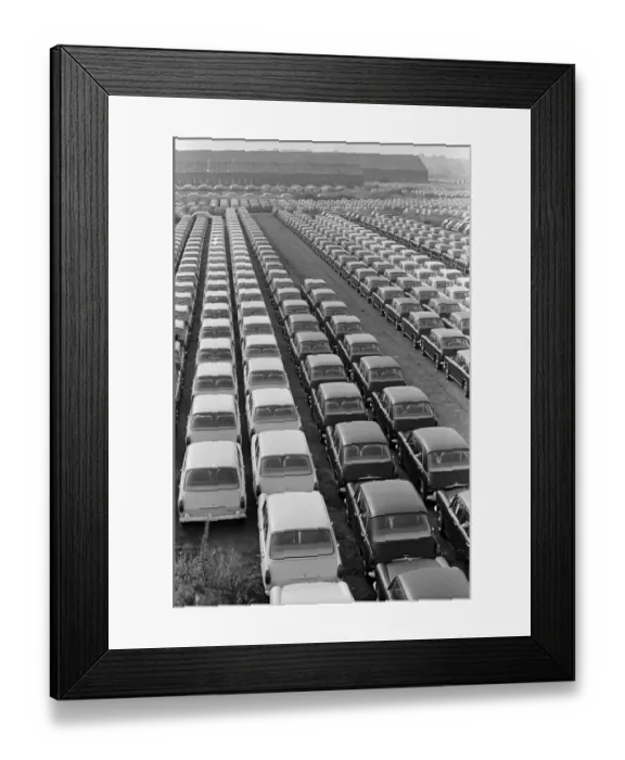 Framed Print : General scenes showing cars parked outside the BMC factory in Longbridge