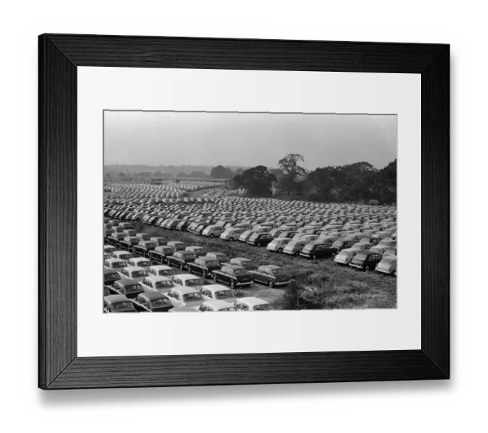 Framed Print : General scenes showing cars parked outside the BMC factory in Longbridge