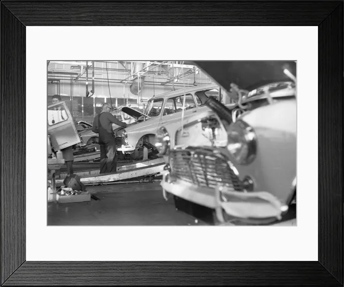 Framed Print : The engine bay on a Austin Mini is prepared to receive its engine on the production line Framed Print : The engine bay on a Austin Mini is prepared to receive its engine on the production line