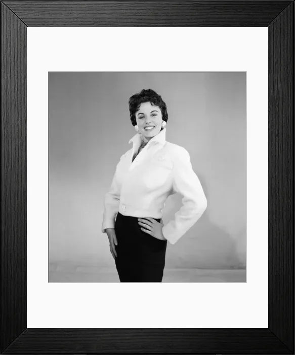 Framed Print : Eunice Gayson, actress and model, poses in a jacket for Sunday Mirror Promotion Framed Print : Eunice Gayson, actress and model, poses in a jacket for Sunday Mirror Promotion