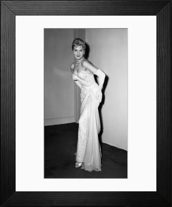 Framed Print : Belinda Lee, British actress previews the evening dresses she will be wearing this year