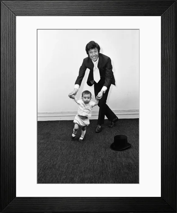 Framed Print : Lionel Blair giving dancing tuition to his 10-month-old son Daniel. 23rd June 1969