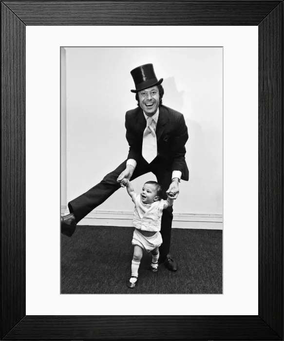 Framed Print : Lionel Blair giving dancing tuition to his 10-month-old son Daniel. 23rd June 1969 Framed Print : Lionel Blair giving dancing tuition to his 10-month-old son Daniel. 23rd June 1969