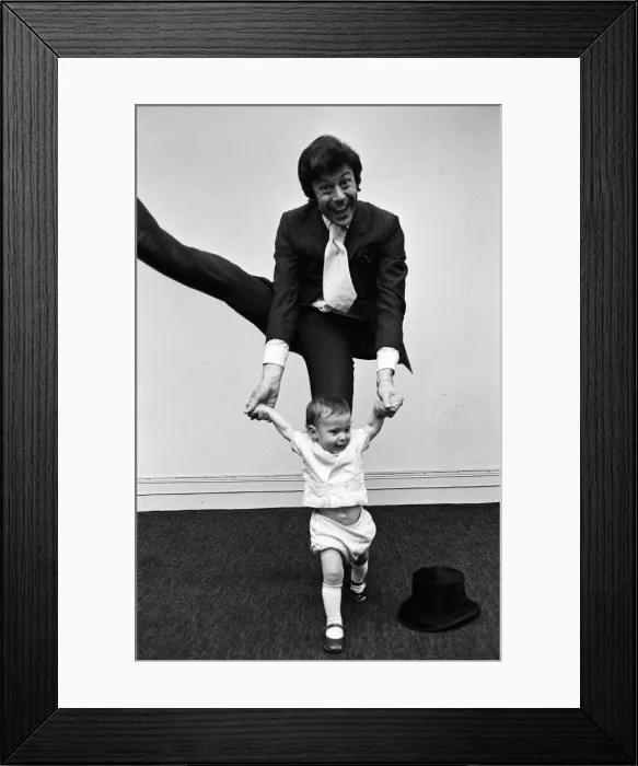 Framed Print : Lionel Blair giving dancing tuition to his 10-month-old son Daniel. 23rd June 1969