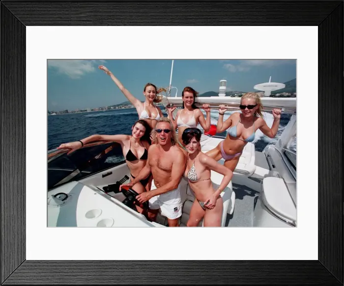 Framed Print : English nightclub owner Peter Stringfellow tries out his new £250 Framed Print : English nightclub owner Peter Stringfellow tries out his new £250