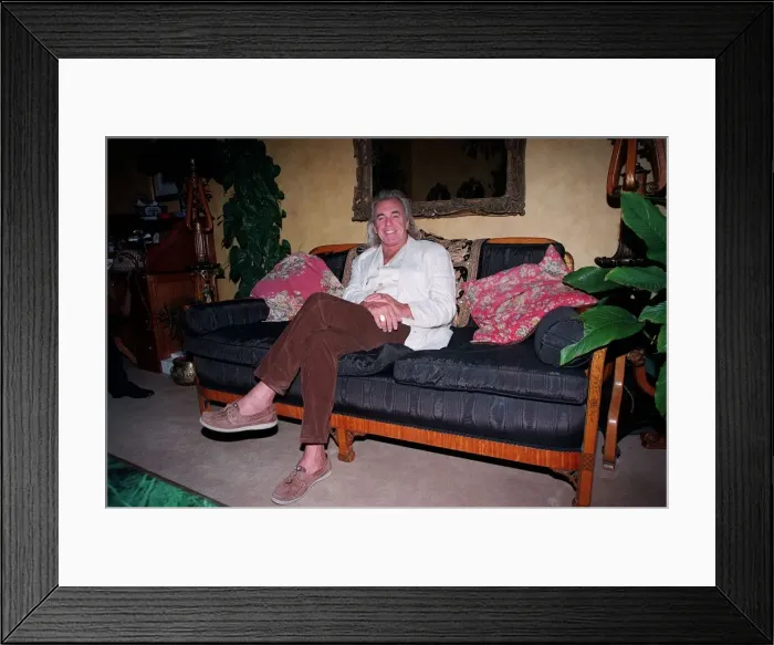 Framed Print : English nightclub owner Peter Stringfellow at home relaxing. September 1998 Framed Print : English nightclub owner Peter Stringfellow at home relaxing. September 1998