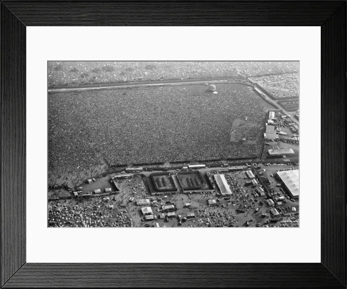 Framed Print : An aerial view of the 120, 000 pop fans massed together at Freshwater on the Isle of Wight Framed Print : An aerial view of the 120, 000 pop fans massed together at Freshwater on the Isle of Wight