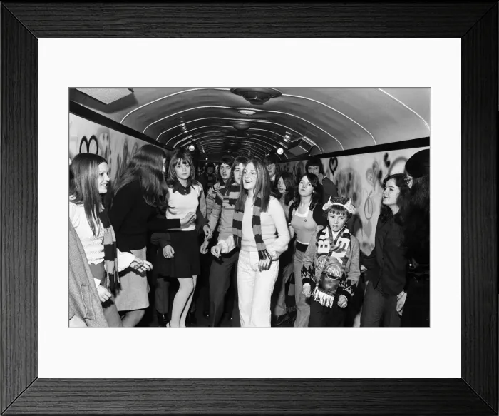 Framed Print : Burnley FC fans enjoy the mobile disco on board the soccer special. 27th January 1973
