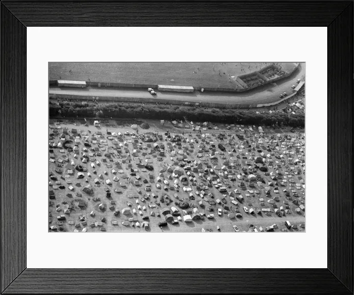 Framed Print : An aerial view of the 120, 000 pop fans massed together at Freshwater on the Isle of Wight Framed Print : An aerial view of the 120, 000 pop fans massed together at Freshwater on the Isle of Wight