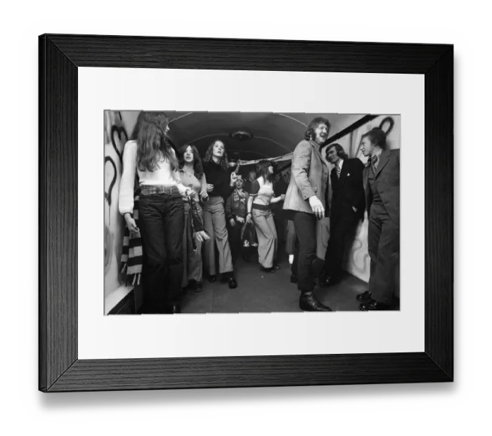 Framed Print : Burnley fans aboard the disco train to London. 28th January 1973