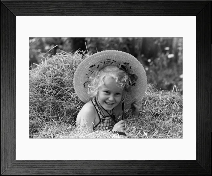 Framed Print : Ella Edwards wearing a sun hat. August 1941
