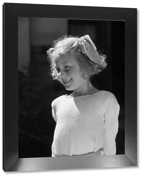 A portrait of a young girl, Ella Edwards. Circa 1942